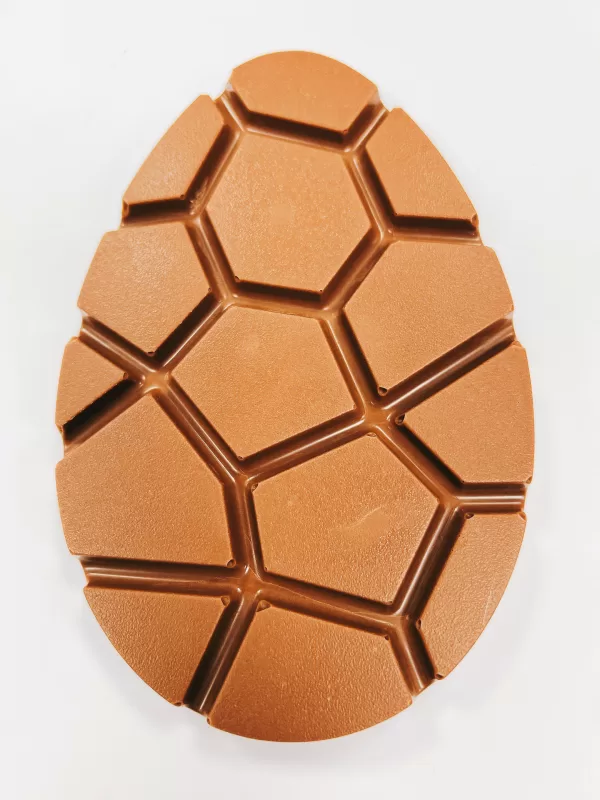 Dotty About Easter cracked egg with geometric shapes.