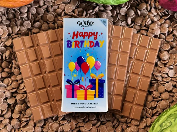 Happy Birthday Colurful Balloons Chocolate Gift Baron a bed of chocolate bars