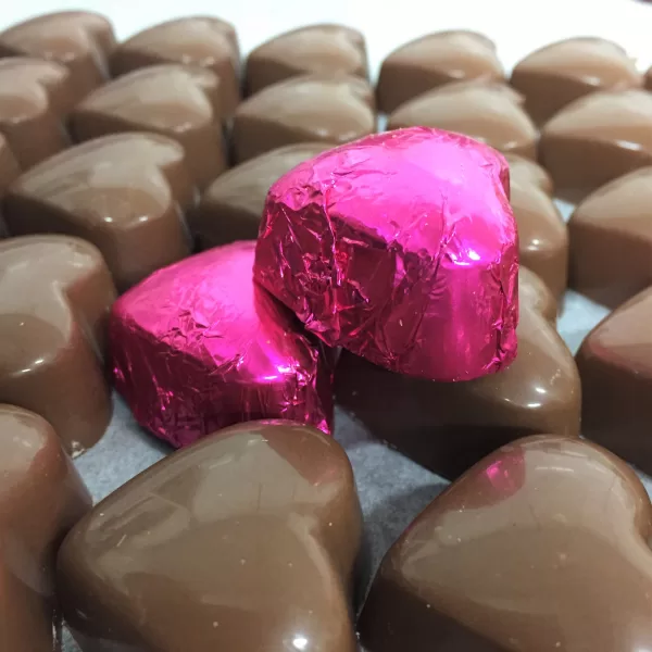 'Love Box' Chocolate Hearts Valentine Collection chocolates displayed on a countertop.