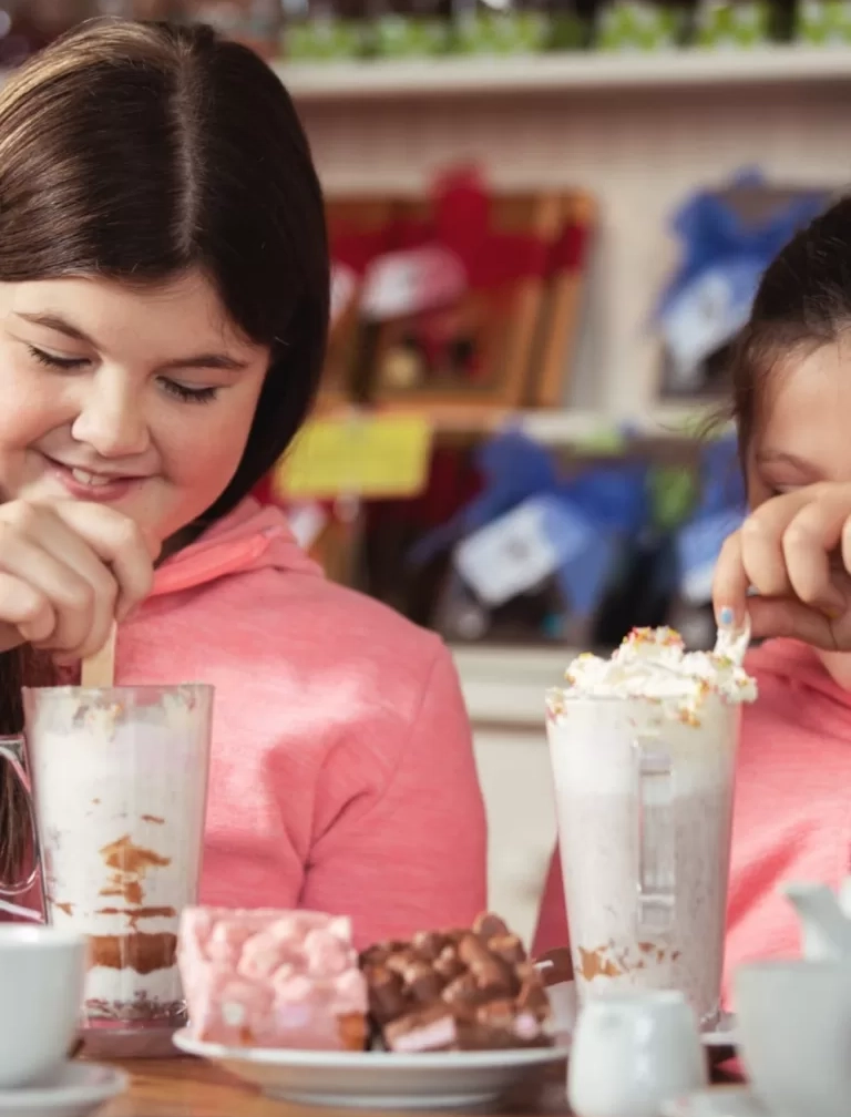 Children drinking milkshakes at Wilde Irish Chocolates Cafe.