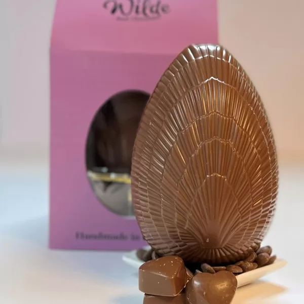 Salty Hearts Milk Chocolate Easter Egg with its pink packaging in the background.