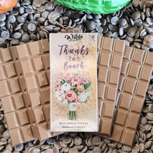 Thanks A Bunch chocolate gift bar on chocolate bars with chocolate buttons in the background