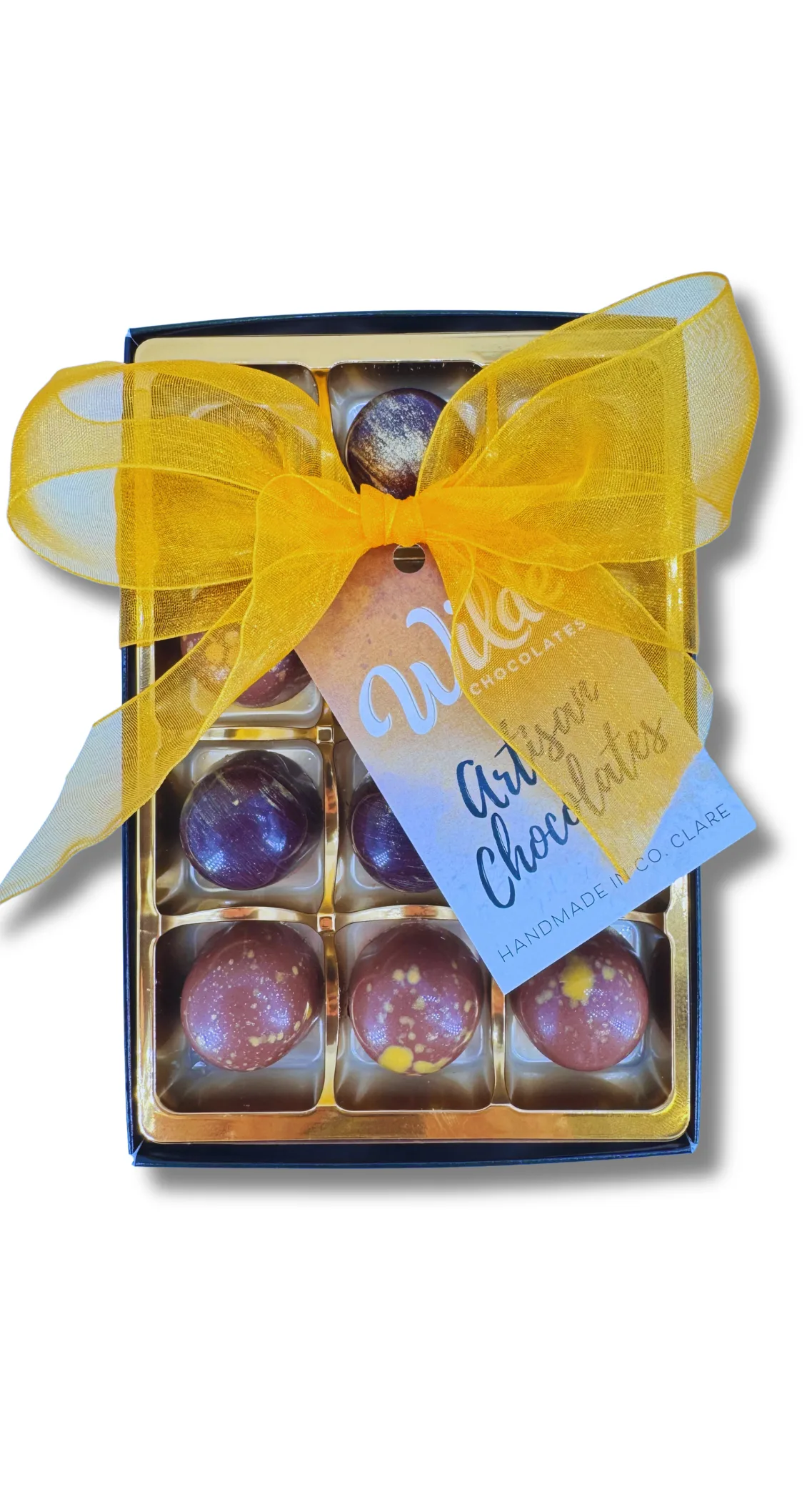 12 Dome Shaped assorted Handpainted dark and milk chocolate truffles in a box tied with a yellow ribbon
